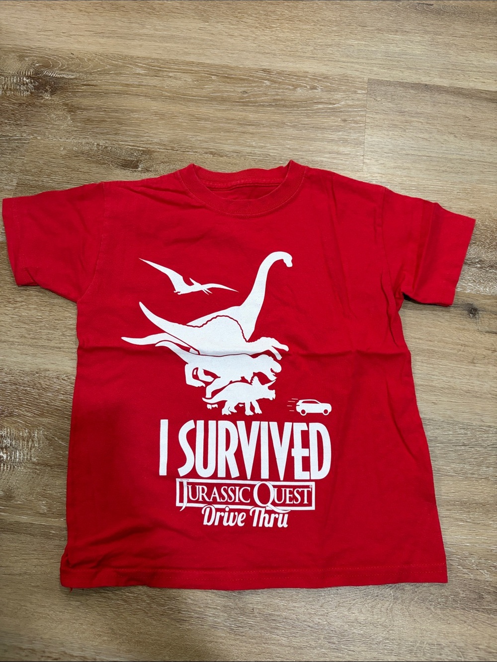 Hanes Red Kids Tee with White Jurassic Quest Graphic